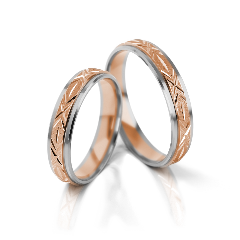 
                  
                    Dviejų spalvų vestuviniai žiedai su graviruotu raštu
                  
                