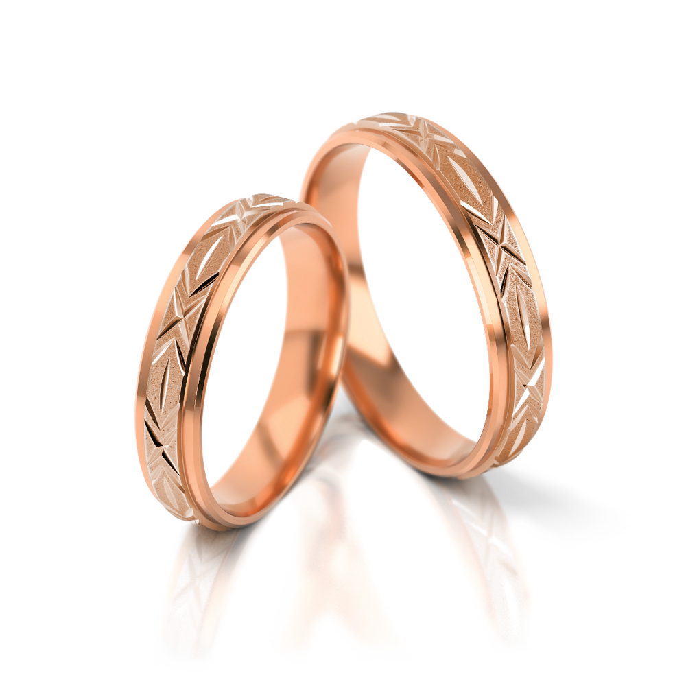 
                  
                    Dviejų spalvų vestuviniai žiedai su graviruotu raštu
                  
                