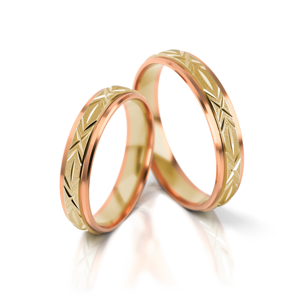 
                  
                    Dviejų spalvų vestuviniai žiedai su graviruotu raštu
                  
                