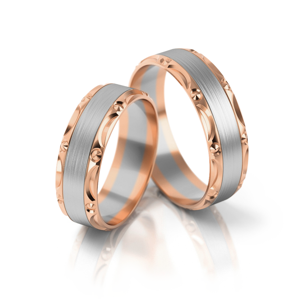 
                  
                    Dviejų spalvų vestuviniai žiedai su ornamentuotu kraštu (6 mm)
                  
                