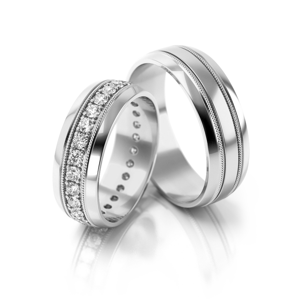 
                  
                    Dviejų spalvų vestuviniai žiedai su briliantais (6.5 mm)
                  
                