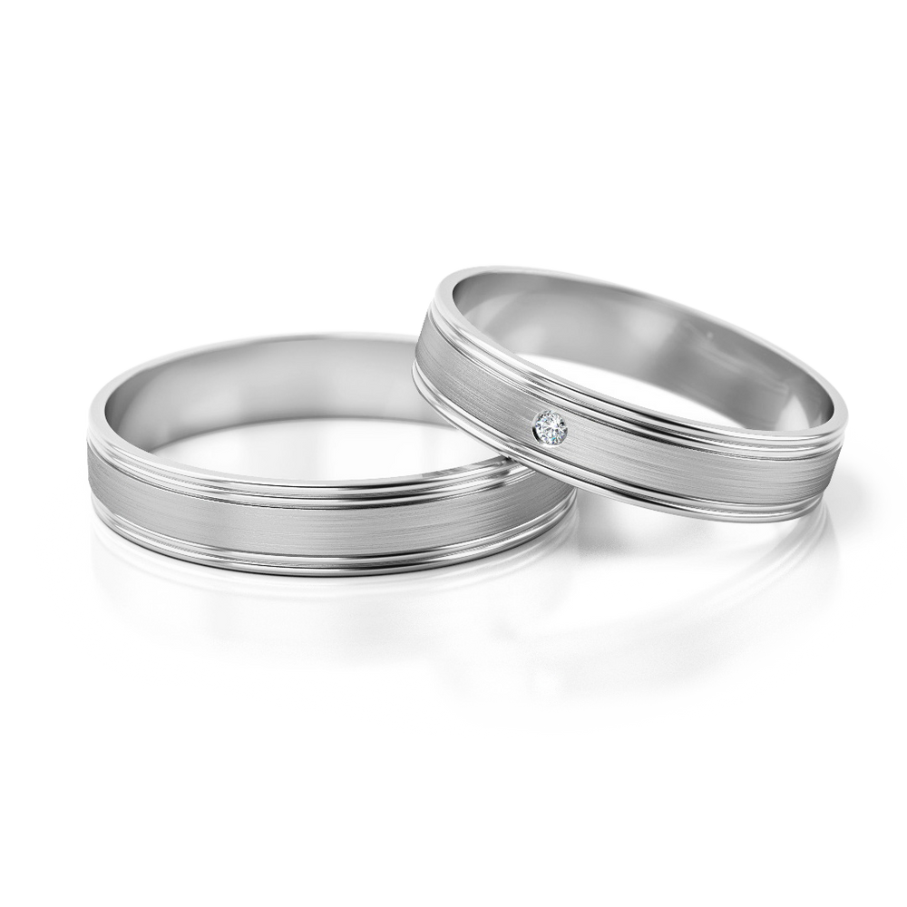 
                  
                    Dviejų aukso spalvų vestuviniai žiedai su deimantu (4 mm)
                  
                