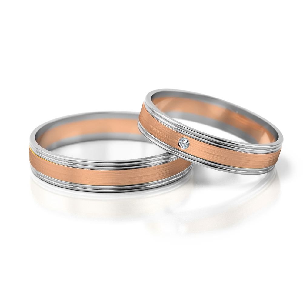 
                  
                    Dviejų aukso spalvų vestuviniai žiedai su deimantu (4 mm)
                  
                