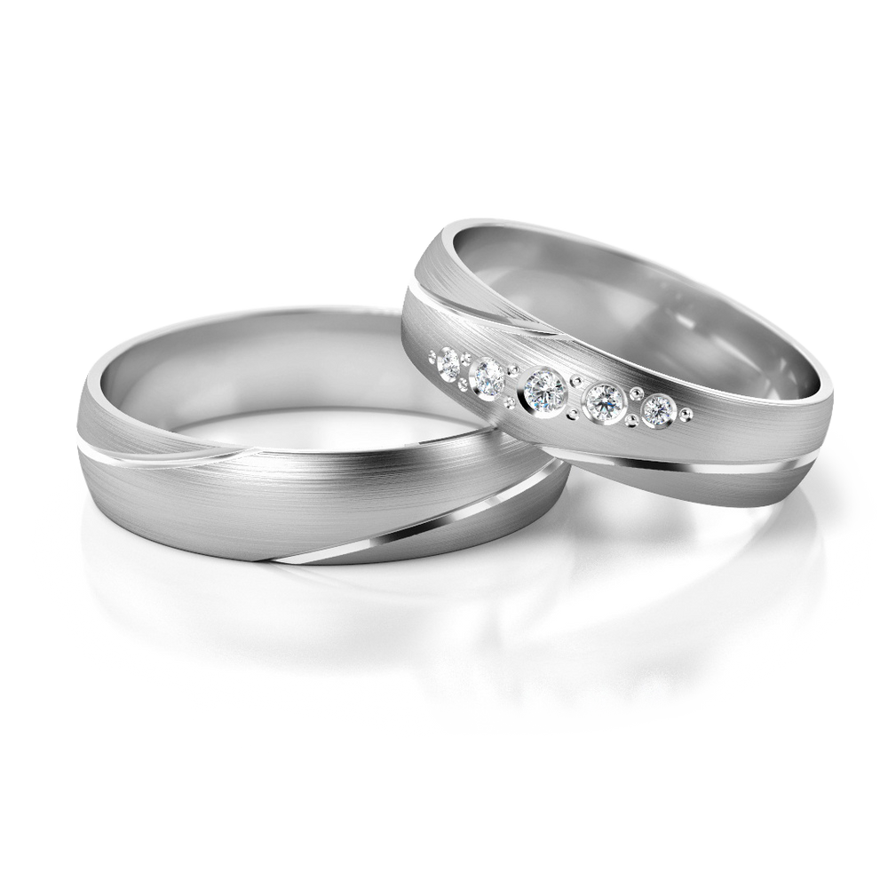 
                  
                    Dviejų spalvų vestuviniai žiedai su 0.07 ct deimantais (5 mm)
                  
                