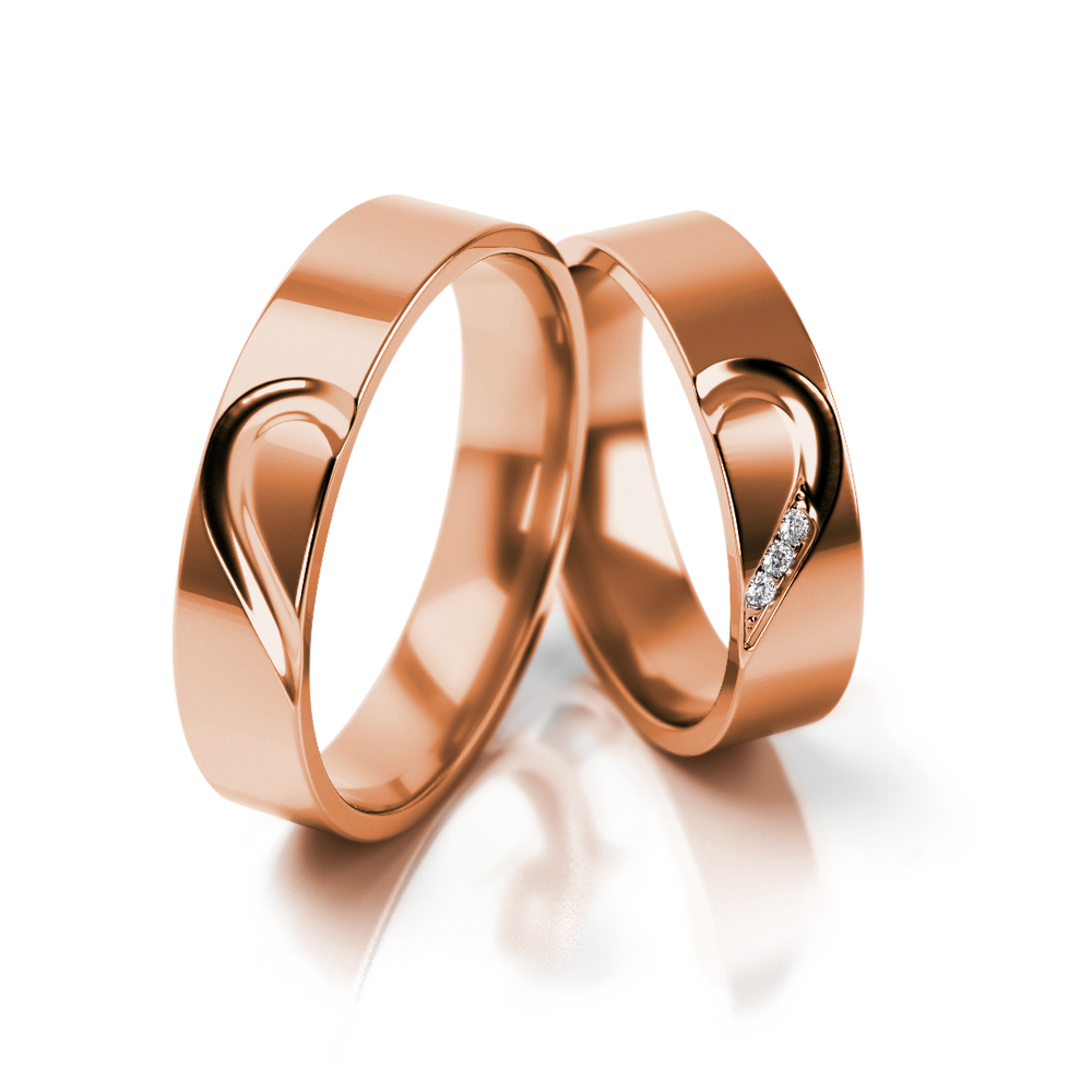 
                  
                    Balto aukso vestuviniai žiedai su širdies simboliu ir 0.03 ct deimantais (5 mm)
                  
                