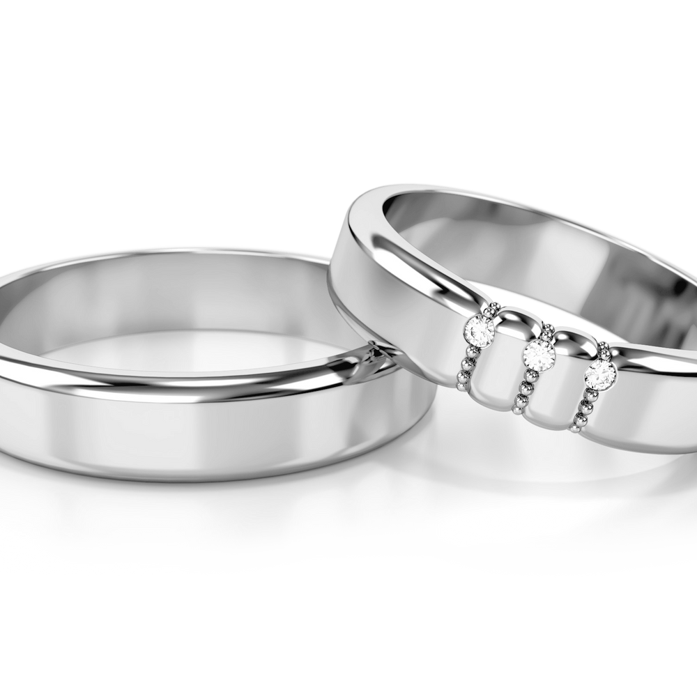 
                  
                    Vestuviniai žiedai – geltonas auksas su trimis deimantais, 4.5 mm pločio
                  
                