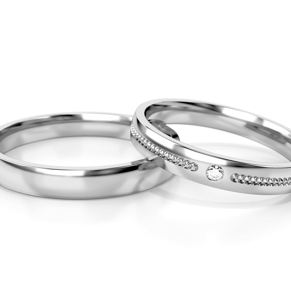 
                  
                    Vestuviniai žiedai iš geltono aukso su deimantu 3 mm pločio, 0.015 ct, 585 praba
                  
                