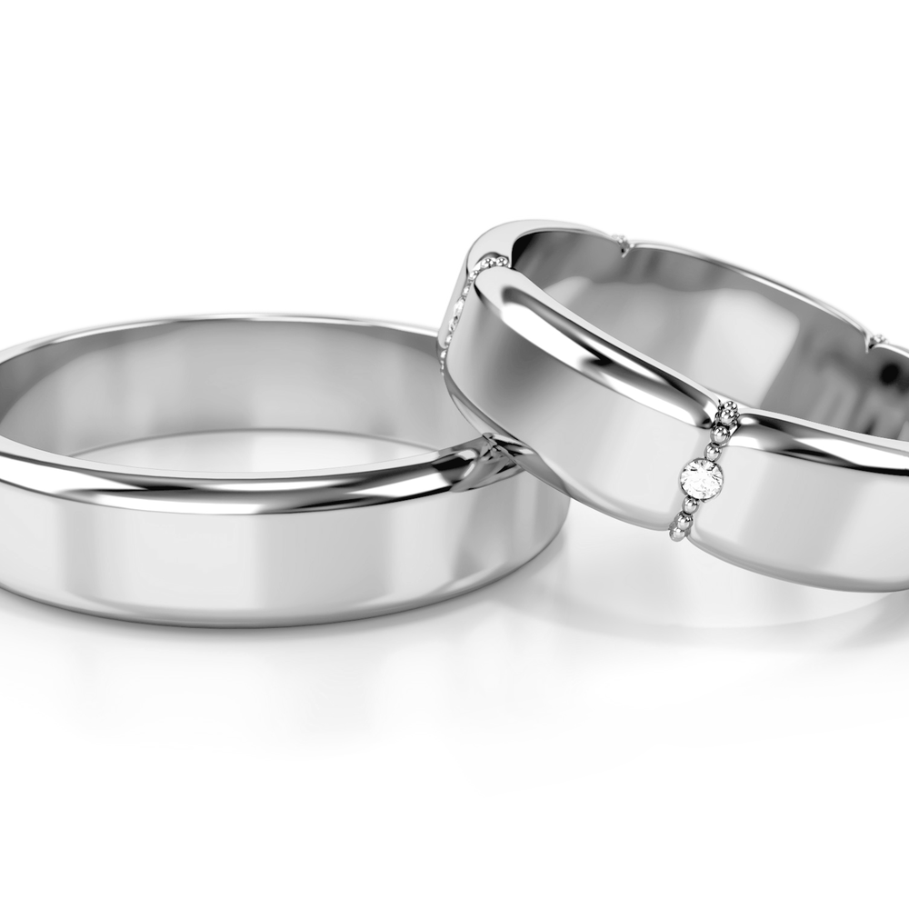 
                  
                    Vestuviniai žiedai – geltonas auksas su deimantais, 5 mm pločio
                  
                