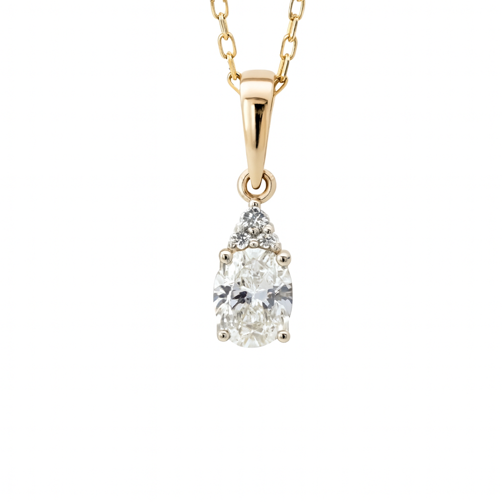 Elegantiškas 14K aukso pakabukas su 0.705 ct laboratoriniu deimantu.