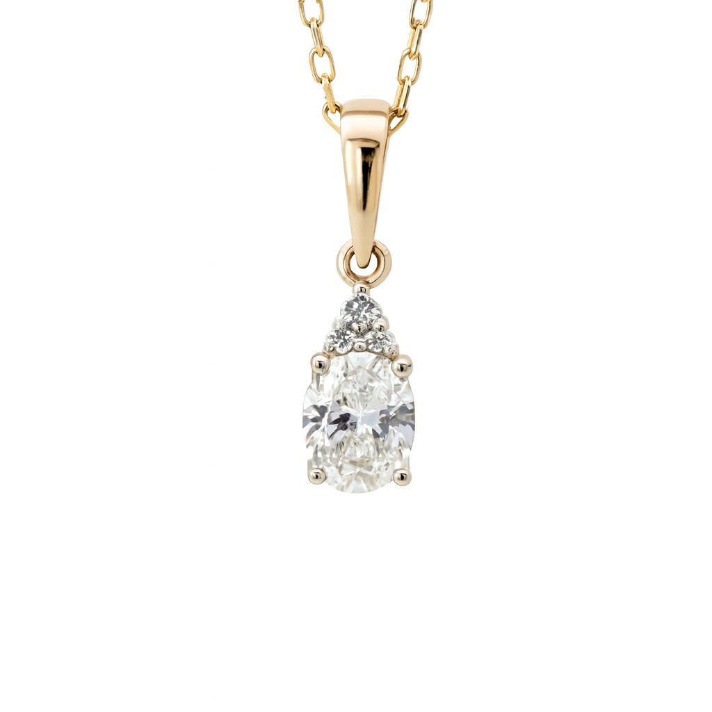 Elegantiškas 14K aukso pakabukas su 0.705 ct laboratoriniu deimantu.