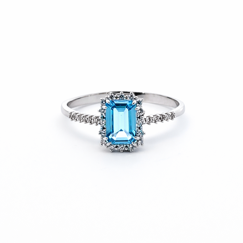 Balto aukso žiedas su Swiss Blue topazu ir briliantais 2.26 g | ADORO juvelyrika