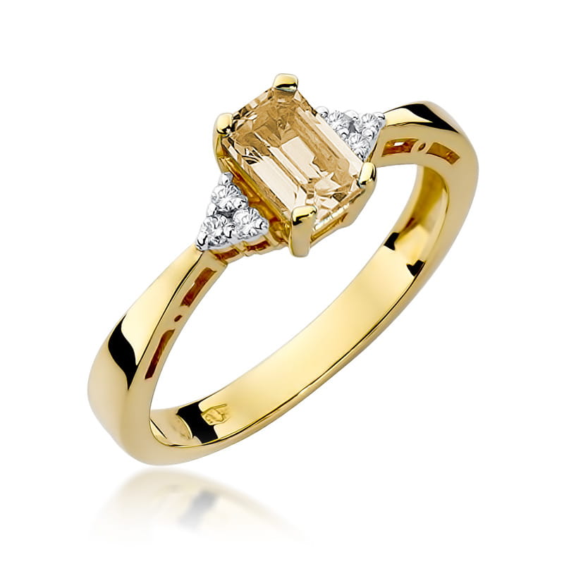 Auksinis žiedas su 0.6 ct citrinu ir briliantais

Prabangus ir elegantiškas auksinis žiedas su 0.6 ct citrinu bei spindinčiais briliantais – tai šiluma ir spindesys, įkūnyti juvelyrikoje.