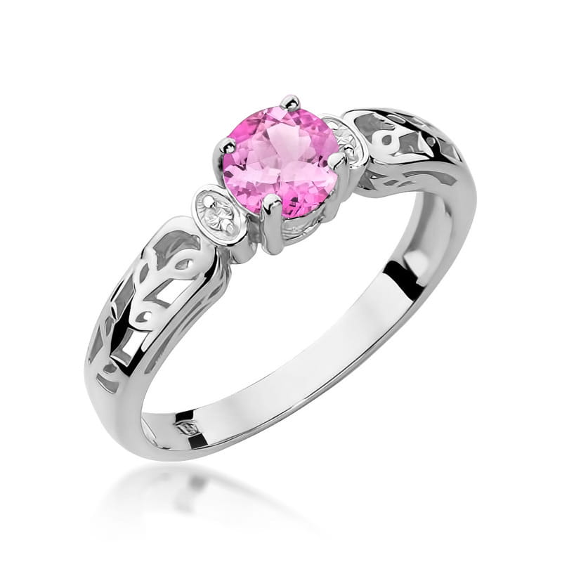 
                  
                    Geltono aukso žiedas su rožiniu topazu ir briliantais

Subtilus, elegantiškas ir rafinuotas – šis geltono aukso žiedas su 0.5 ct rožiniu topazu ir spindinčiais briliantais yra tobulas pasirinkimas moteriai, vertinančiai išskirtinį grožį.
                  
                