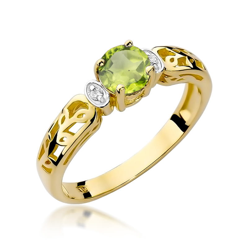 Geltono aukso žiedas su 0.6 ct olivinu (peridotu) ir briliantais – tai prabangus ir elegantiškas pasirinkimas. Šiltas geltono aukso atspalvis harmoningai dera su olivino žalia spalva, išryškindamas jo natūralų grožį. 0.6 ct peridotas suteikia žiedui išraiškingumo, o briliantai prideda subtilaus spindesio.

Ar ieškote konkretaus dizaino ar tiesiog domitės galimybėmis? 😊