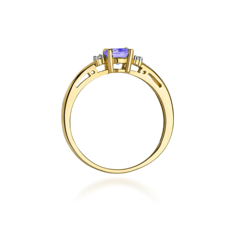 
                  
                    Geltono aukso žiedas su 0.5 ct tanzanitu ir briliantais – išskirtinė elegancija ir prabanga, sukurta moteriai, vertinančiai unikalius akmenis ir nesenstančią klasiką.

Žiedo centre spindi 0.5 ct natūralus tanzanitas – reta ir kerinti mėlynai violetinės spalvos brangakmenio variacija, simbolizuojanti intuiciją, ramybę ir vidinę stiprybę. Jo sodrus atspalvis tobulai dera su 585 arba 750 prabos geltono aukso šilta prabanga, sukuriant harmoningą ir išraiškingą derinį. Aplink tanzanitą žėrintys briliantai suteik
                  
                