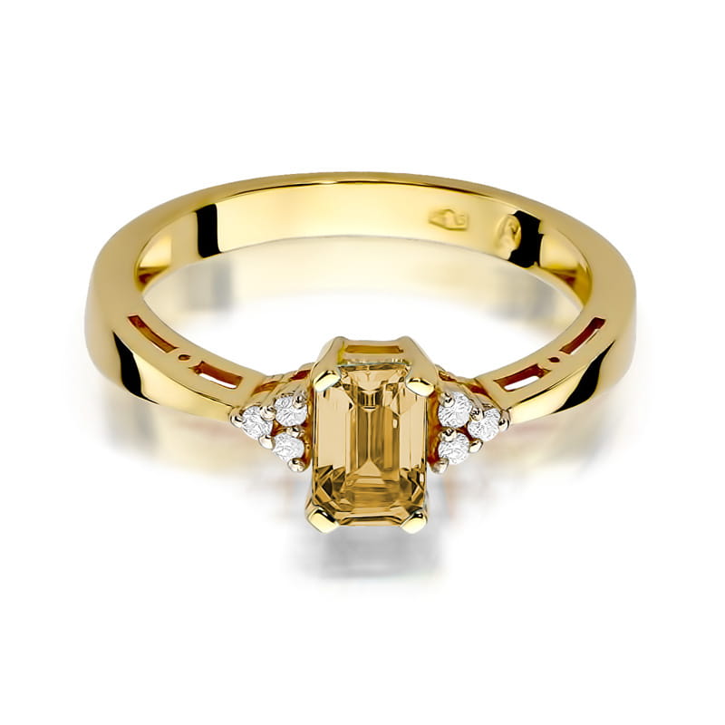 Auksinis žiedas su 0.6 ct citrinu ir briliantais

Prabangus ir elegantiškas auksinis žiedas su 0.6 ct citrinu bei spindinčiais briliantais – tai šiluma ir spindesys, įkūnyti juvelyrikoje.