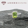 Balto aukso žiedas su emerald cut natūraliu olivinu ir briliantais – ADORO juvelyrika