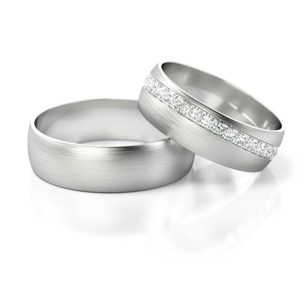 Prabangūs vestuviniai žiedai su 0.6 ct deimantų eile